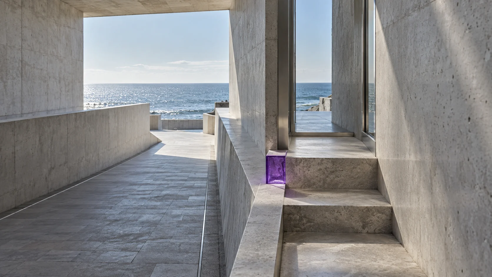 A stone walkway runs on along the parapet towards the sea; beside it a short flight of steps turns off to a doorway, with an amethyst glass block set at its foot.
